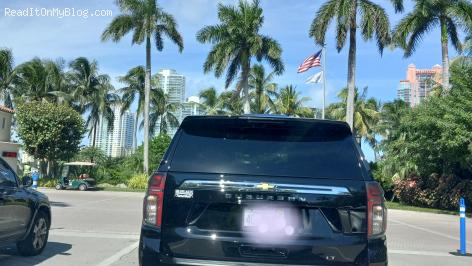 Take a look at Miami Beach across the palm trees of Fisher Island Florida. Waiting to get on the ferry